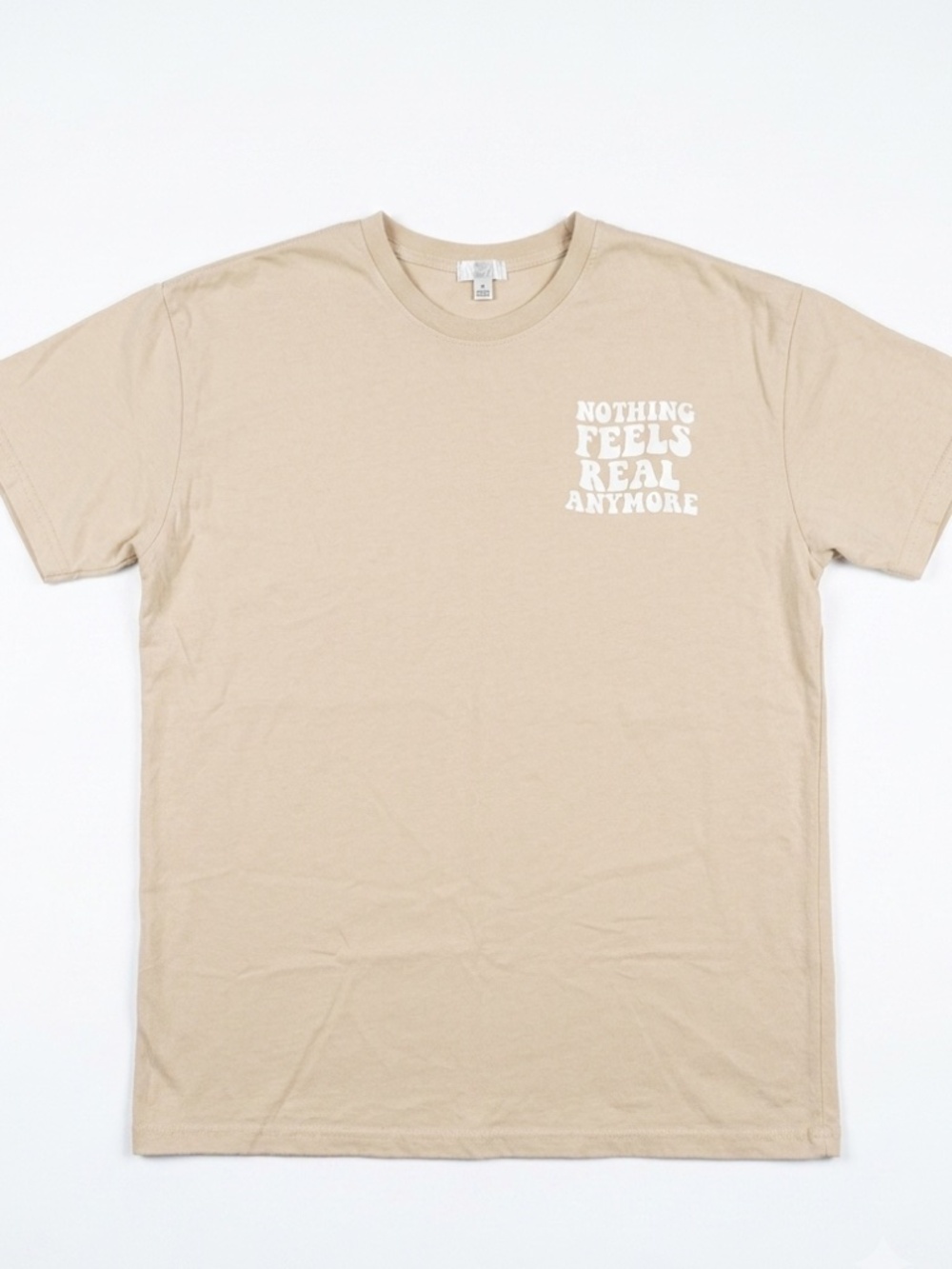 Nothing feels Real Anymore tee
